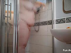 horny german milf spreads wide in tub and fingers cunt