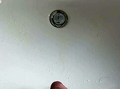 boy pisses in sink and farts loud