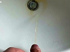 boy pisses in sink and farts loud