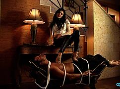 Femdom beauty imposes control wearing high heels and silk