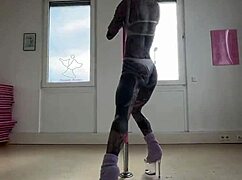 Anuskatzz dances on the pole with goth energy
